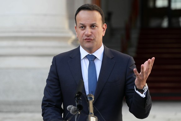 Irish Prime Minister Leo Varadkar speaks to the media outside the Government Buildings in Dublin Wednesday Jan. 16, 2019, after Britain&#039;s Parliament discarded Prime Minister Theresa May&#039;s Br ...