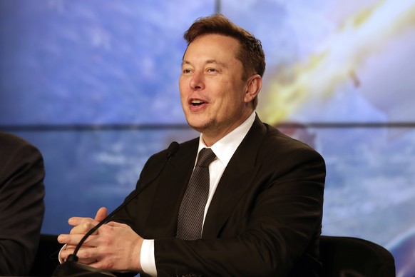 FILE - In this Jan. 19, 2020, file photo Elon Musk, Tesla CEO, speaks during a news conference at the Kennedy Space Center in Cape Canaveral, Fla. Tesla is now worth more than General Motors, Ford and ...