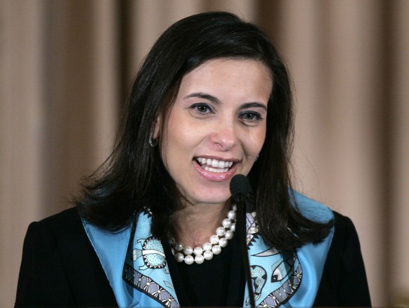 In this photo taken Jan. 6, 2006 Dina Powell speaks at the State Department in Washington. President-elect Donald Trump says he plans to appoint Goldman Sachs partner Dina Powell to a senior role in h ...
