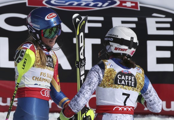 Alpine Skiing - FIS Alpine Skiing World Championships - Women&#039;s Slalom - St. Moritz, Switzerland - 18/2/17 - Mikaela Shiffrin (L) of the USA talks with Wendy Holdener of Switzerland in the finish ...