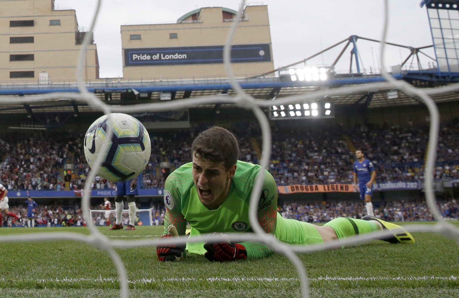Chelsea goalkeeper Kepa Arrizabalaga reacts after failing to stop the goal scored by Arsenal&#039;s Alex Iwobi during the English Premier League soccer match between Chelsea and Arsenal at Stamford br ...
