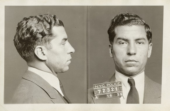 In this April 18, 1936 photo provided by the New York City Municipal Archives, the police booking photo of Charles Lucky Luciano is shown in New York. Over 870,000 photos from an archive that exceed ...