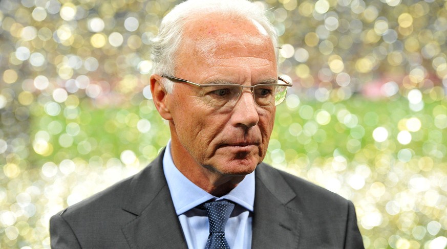 epa05166189 (FILE) A file picture dated 13 August 2010 of German soccer legend Franz Beckenbauer leaving after a friendly soccer match between Bayern Munich and Real Madrid in Munich, Germany. Franz B ...