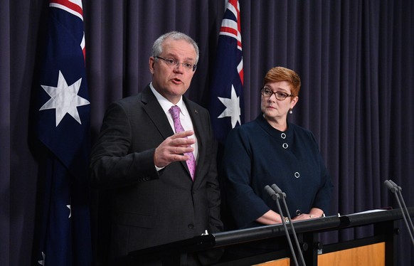 epa07096266 Australian Prime Minister Scott Morrison (L) speaks to the media alongside Minister for Foreign Affairs Marise Payne (R) during a press conference at Parliament House in Canberra, Australi ...