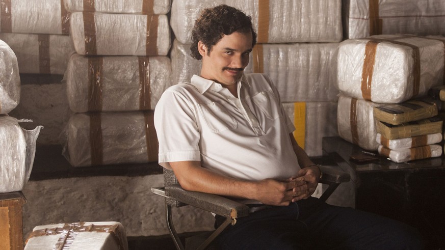This image released by Netflix shows Wagner Moura as Pablo Escobar in the Netflix Original Series &quot;Narcos.&quot; The show has been named one of the 10 Best TV shows by The Associated Press. (Dani ...