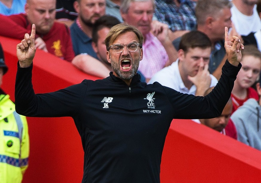epa06166812 Liverpool manager Juergen Klopp reacts during the English Premier League soccer match between Liverpool FC and Arsenal FC at Anfield in Liverpool, Britain, 27 August 2017. EPA/PETER POWELL ...