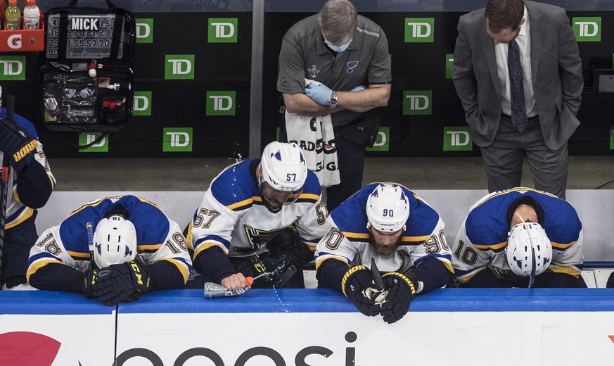 St. Louis Blues&#039; Robert Thomas (18), David Perron (57), Ryan O&#039;Reilly (90) and Brayden Schenn (10) react after losing to the Vancouver Canucks in an NHL Western Conference Stanley Cup playof ...