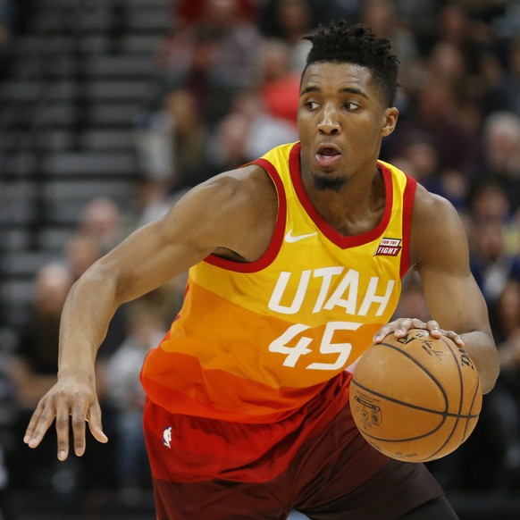 FILE- In this Feb. 9, 2018, file photo, Utah Jazz guard Donovan Mitchell (45) drives up court in the second half during an NBA basketball game against the Charlotte Hornets in Salt Lake City. Mitchell ...