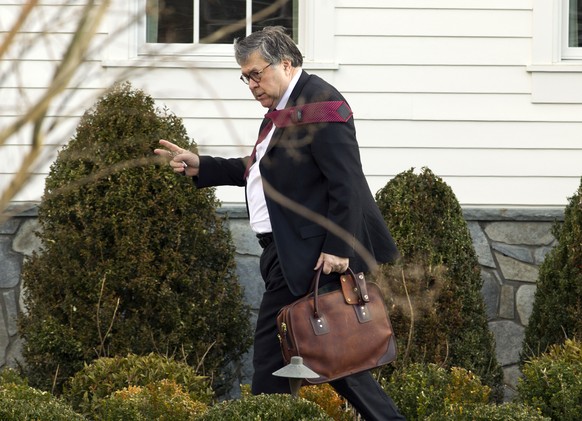 Attorney General William Barr leaves his home in McLean, Va., on Friday, March 22, 2019. Special Counsel Robert Mueller is expected to present a report to the Justice Department any day now outlining  ...