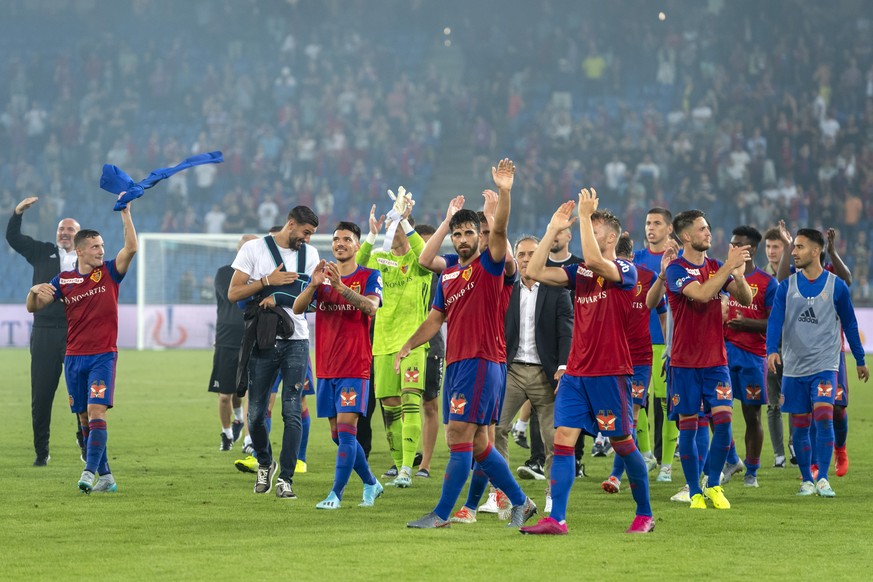 Basel&#039;s players cheer after winning the UEFA Champions League second qualifying round second leg match between Switzerland&#039;s FC Basel 1893 and Netherland&#039;s PSV Eindhoven in the St. Jako ...