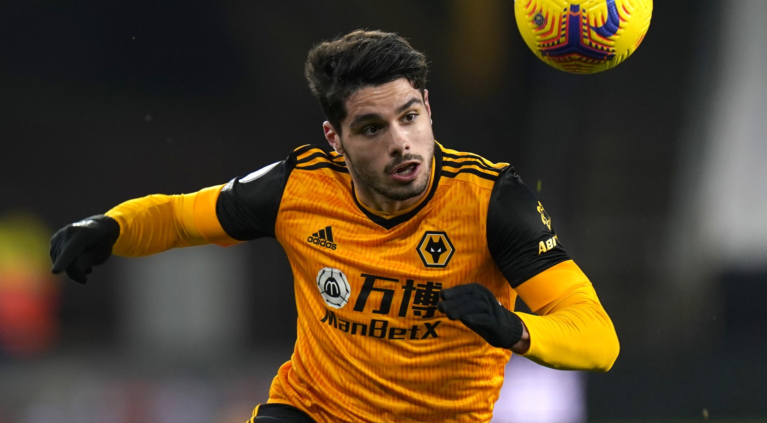 Wolverhampton Wanderers&#039; Pedro Neto controls the ball during the English Premier League soccer match between Wolverhampton Wanderers and Everton at the Molineux Stadium in Wolverhampton, England, ...