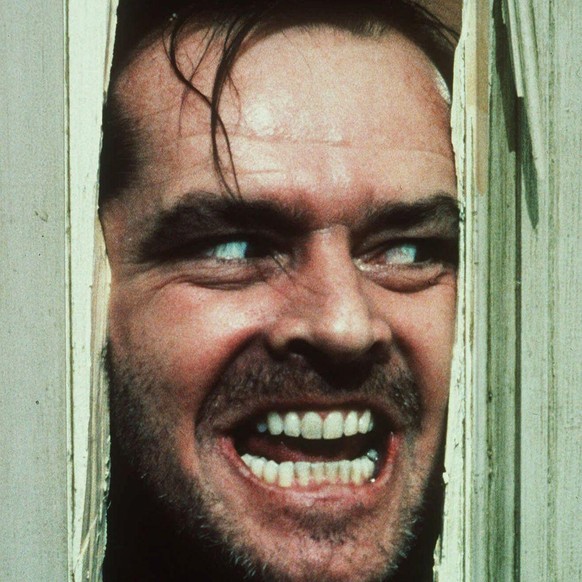 FILE- In this file image courtesy of Warner Bros. Inc., actor Jack Nicholson, portraying &quot;Jack Torrance&quot; in the movie &quot;The Shining&quot; directed by Stanley Kubrick, peers through a hol ...