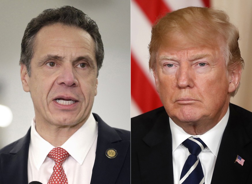 This combination of two file photos shows New York Gov. Andrew Cuomo on Feb. 14, 2019, and President Donald Trump on April 17, 2018. New York&#039;s Democratic governor told reporters Wednesday, Feb.  ...
