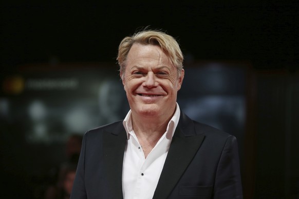 Actor Eddie Izzard poses for photographers at the premiere of the film &#039;Victoria and Abdul&#039; during the 74th edition of the Venice Film Festival in Venice, Italy, Sunday, Sept. 3, 2017. (Phot ...