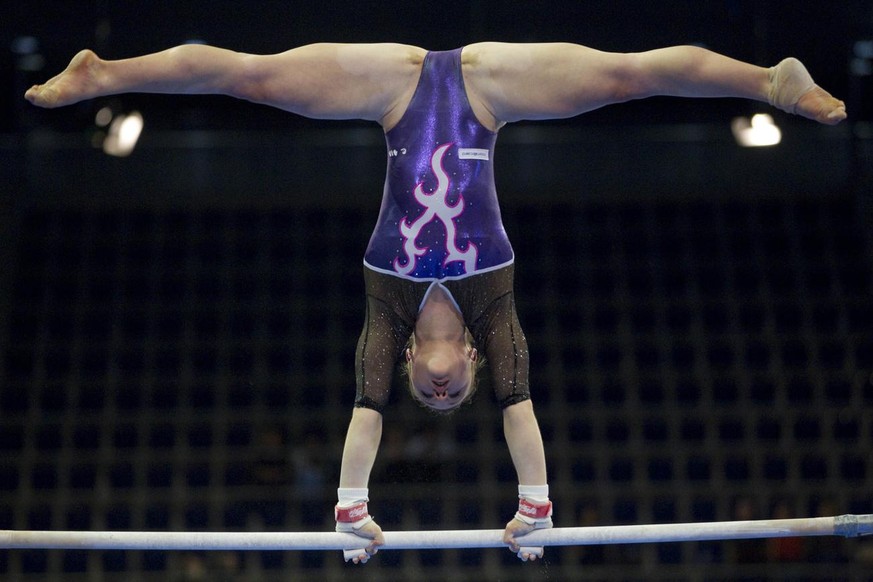 Ariella Kaeslin of Switzerland performs on the uneven bars at the Women&#039;s Qualification of the Artistic Gymnastics European Championships in Berlin, Germany, Wednesday, April 6, 2011. The Finals  ...