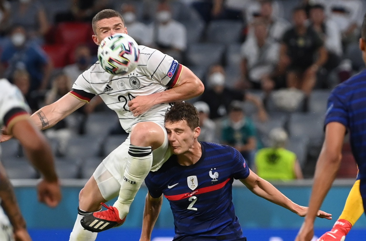 epa09274710 Robin Gosens (L) of Germany in action against Benjamin Pavard of France during the UEFA EURO 2020 group F preliminary round soccer match between France and Germany in Munich, Germany, 15 J ...