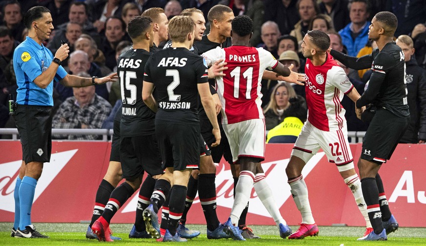 epa08263106 Players of Ajax (red) and Alkmaar (black) scuffle during the Dutch Eredivisie soccer match between Ajax Amsterdam and AZ Alkmaar at Johan Cruijff Arena in Amsterdam, Netherlands, 01 March  ...