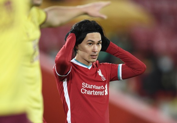 epa08956689 Takumi Minamino of Liverpool reacts during the English Premier League soccer match between Liverpool FC and Burnley FC in Liverpool, Britain, 21 January 2021. EPA/Peter Powell / POOL EDITO ...