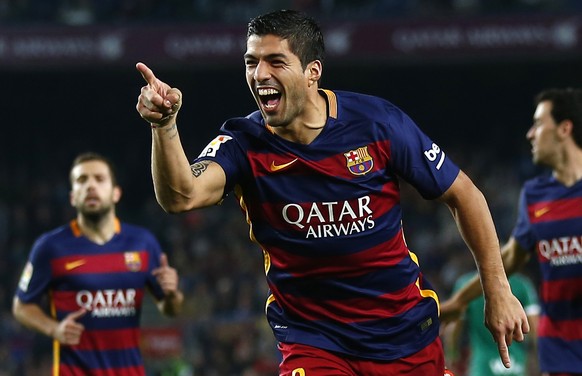 FILE - In this Oct. 25, 2015 file photo, FC Barcelona&#039;s Luis Suarez celebrates after scoring against Eibar during a Spanish La Liga soccer match at the Camp Nou stadium in Barcelona, Spain. (AP P ...