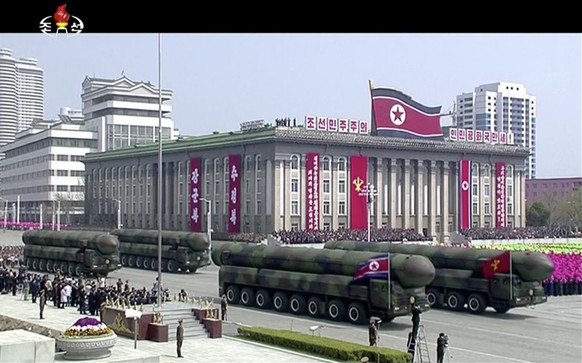 In this image made from video provided by North Korean broadcaster KRT, missiles are displayed during a parade at Kim Il Sung Square in Pyongyang, Saturday, April 15, 2017. North Korean leader Kim Jon ...