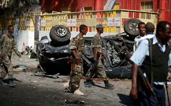 Somali government soldiers secure the scene of an attack on a restaurant by the Somali Islamist group al Shabaab in the capital Mogadishu, Somalia, October 1, 2016. To go with SOMALIA-UN/ REUTERS/Feis ...