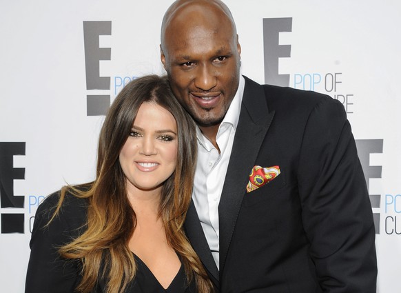 FILE - In this April 30, 2012, file photo, Khloe Kardashian Odom and Lamar Odom from the show &quot;Keeping Up With The Kardashians&quot; attend an E! Network upfront event at Gotham Hall in New York. ...