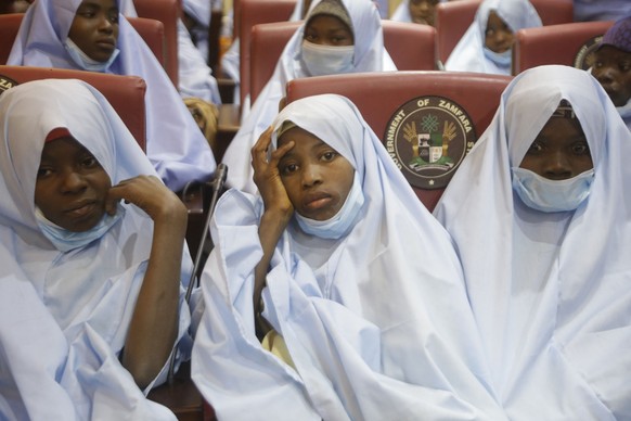 Some of the students who were abducted by gunmen from the Government Girls Secondary School, in Jangebe, last week are seen after their release meeting with the state Governor Bello Matawalle, in Gusa ...