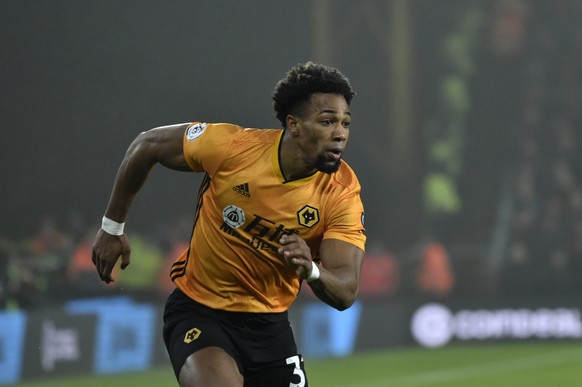 Wolverhampton Wanderers&#039; Adama Traore runs for the ball during the English Premier League soccer match between Wolverhampton Wanderers and Liverpool at the Molineux Stadium in Wolverhampton, Engl ...