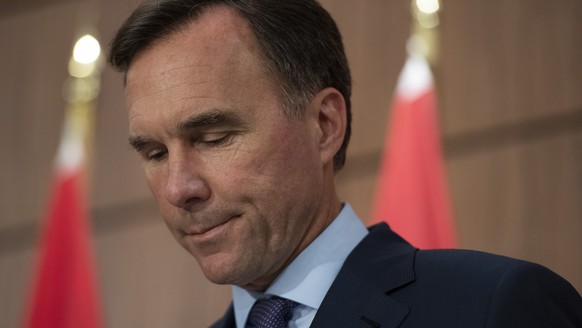 Minister of Finance Bill Morneau announces his resignation during a news conference on Parliament Hill in Ottawa, on Monday, Aug. 17, 2020. (Justin Tang/The Canadian Press via AP)