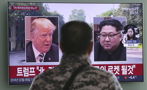 A man watches a TV screen showing images of U.S. President Donald Trump, left, and North Korean leader Kim Jong Un during a news program at the Seoul Railway Station in Seoul, South Korea, Saturday, F ...