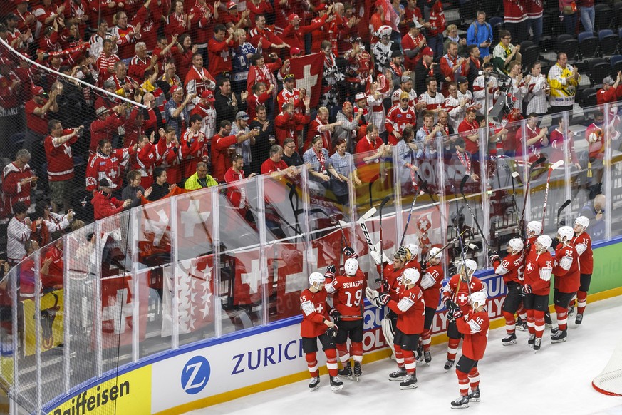 Switzerland&#039;s players cheer their supporters after beating Belarus, during the IIHF 2018 World Championship preliminary round game between Switzerland and Belarus, at the Royal Arena, in Copenhag ...