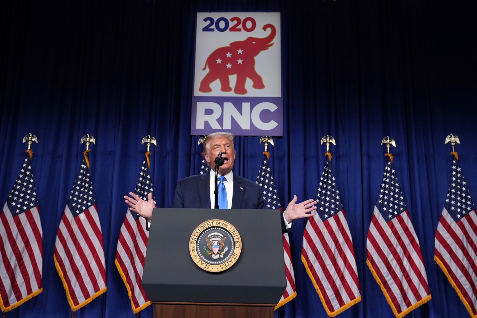 President Donald Trump speaks on stage during the first day of the Republican National Committee convention, Monday, Aug. 24, 2020, in Charlotte. (AP Photo/Evan Vucci)
Donald Trump