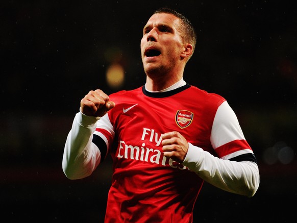 FILE - JULY 04, 2015: Arsenal striker Lukas Podolski sigins for Galatasaray on July 04, 2015. LONDON, ENGLAND - JANUARY 24: Lukas Podolski of Arsenal celebrates as he scores their second goal with a h ...