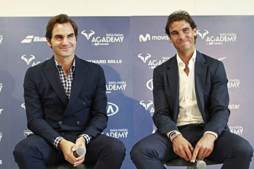 epa05592004 Spanish tennis player Rafael Nadal (R) and Swiss player Roger Federer (L) attend the opening ceremony of the Rafa Nadal Academy in Manacor, Mallorca island, Balearics, Spain, 19 October 20 ...