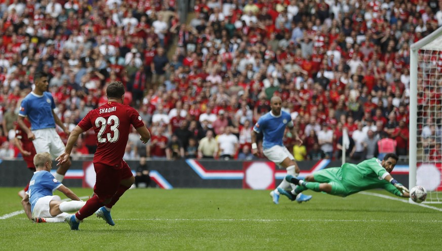Liverpool&#039;s Xherdan Shaqiri shoots at goal but his shot is saved by Manchester City&#039;s goalkeeper Claudio Bravo during the Community Shield soccer match between Manchester City and Liverpool  ...
