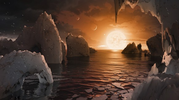 This image provided by NASA/JPL-Caltech shows an artist&#039;s conception of what the surface of the exoplanet TRAPPIST-1f may look like, based on available data about its diameter, mass and distances ...