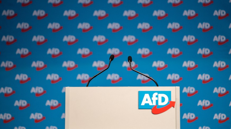 epa07282311 The lectern with the logo of Alternative for Germany (AfD) party during the European election convention (Europawahlversammlung) of the AfD in Riesa, Germany, 14 January 2019. The AfD gath ...
