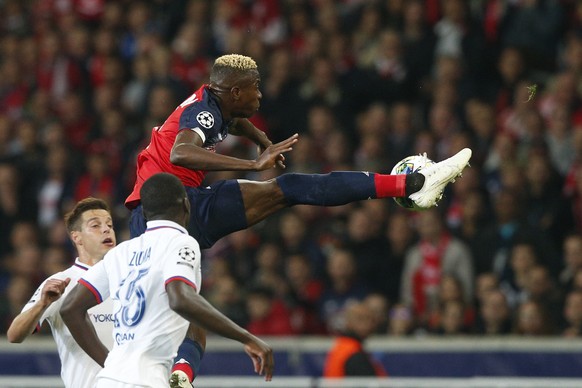 Lille&#039;s Victor Osimhen, top, kicks the ball during the group H Champions League soccer match between Lille and Chelsea at the Stade Pierre Mauroy - Villeneuve d&#039;Ascq stadium in Lille, France ...