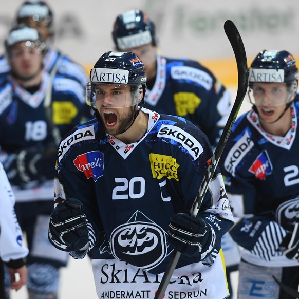 Ambri&#039;s player Elias Bianchi, center, celebrates the 2-1 goal, during the third match of the playout final in National League Swiss Championship between HC Ambri-Piotta and EHC Kloten, at the ice ...