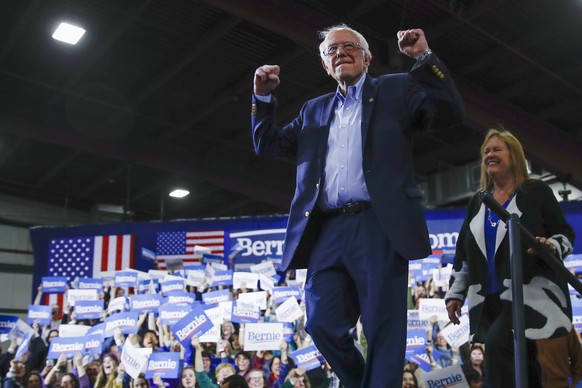 Democratic presidential candidate Sen. Bernie Sanders, I-Vt., accompanied by his wife Jane O&#039;Meara Sanders, arrives to speak during a primary night election rally in Essex Junction, Vt., Tuesday, ...