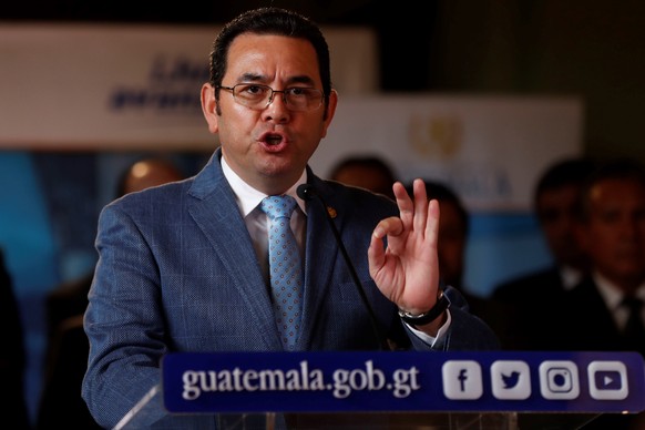 epa07818102 Guatemalan President Jimmy Morales speaks during a press conference at the National Palace of Culture in Guatemala City, Guatemala, 04 September 2019. Government of Guatemala declared the  ...