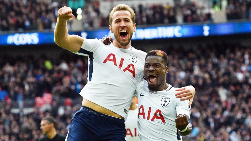 epa06282534 Tottenham&#039;s Harry Kane (L) celebrates with his teammate Serge Aurier (R) after scoring the 1-0 lead during the English Premier League soccer match between Tottenham Hotspur and Liverp ...