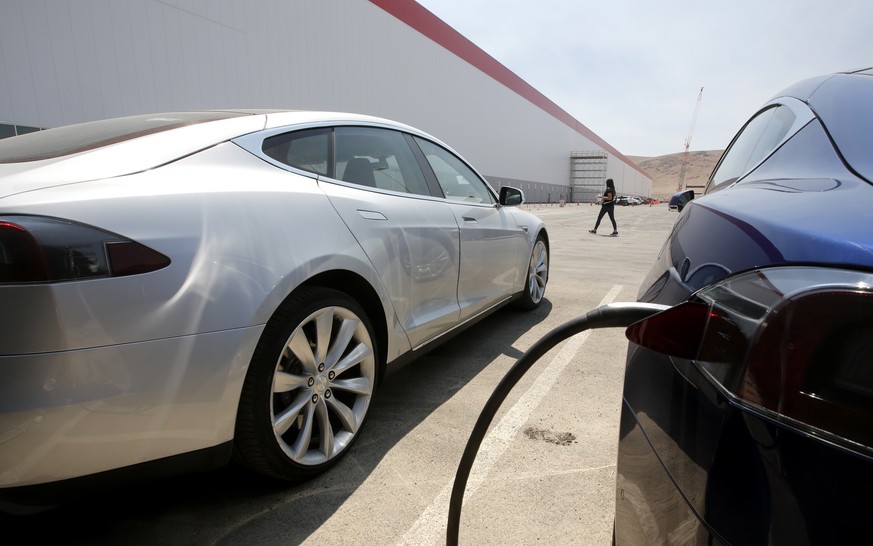 Tesla Motors model S cars are charged at the new Tesla Gigafactory, Tuesday, July 26, 2016, in Sparks, Nev. The Gigafactory is Tesla Motors’ biggest bet yet: A massive, $5 billion factory in the Nevad ...