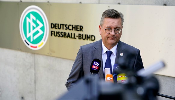 epa06900274 DFB President Reinhard Grindel gives a press statement after a meeting of DFB leaders with head coach Joachim Loew (not in picture) in Frankfurt, Germany, 20 July 2018. EPA/ALEXANDER BECHE ...