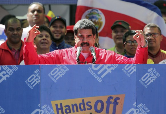 Venezuela&#039;s President Nicolas Maduro speaks to supporters during a pro-government rally in Caracas, Venezuela, Saturday, Feb. 23, 2019. Maduro has closed Venezuela&#039;s borders and calls humani ...
