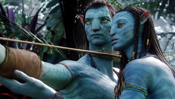 FILE - This image released by 20th Century Fox shows the characters Neytiri, right, and Jake in a scene from the 2009 movie &quot;Avatar.&quot; Fans of the film “Avatar” can now experience Pandora in  ...