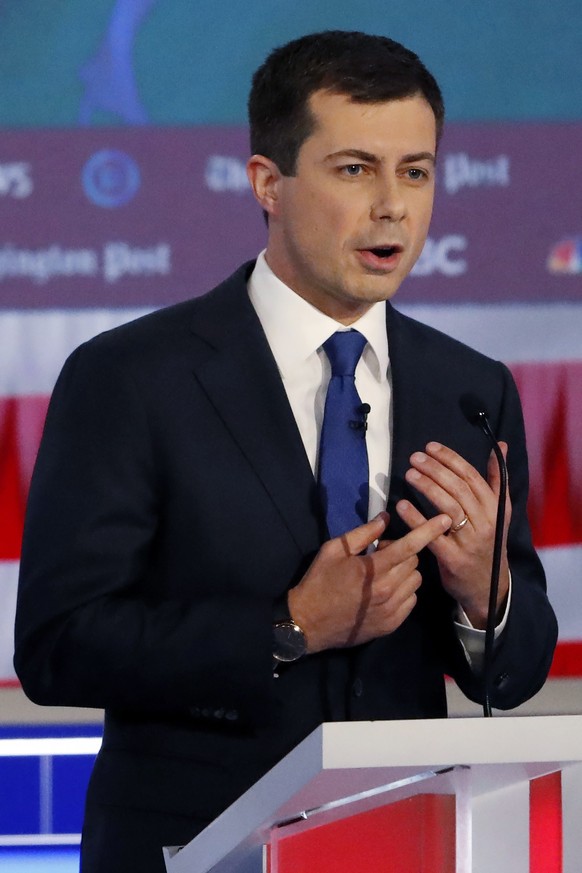 Democratic presidential candidate South Bend, Ind., Mayor Pete Buttigieg speaks about his marriage during a Democratic presidential primary debate, Wednesday, Nov. 20, 2019, in Atlanta. (AP Photo/John ...