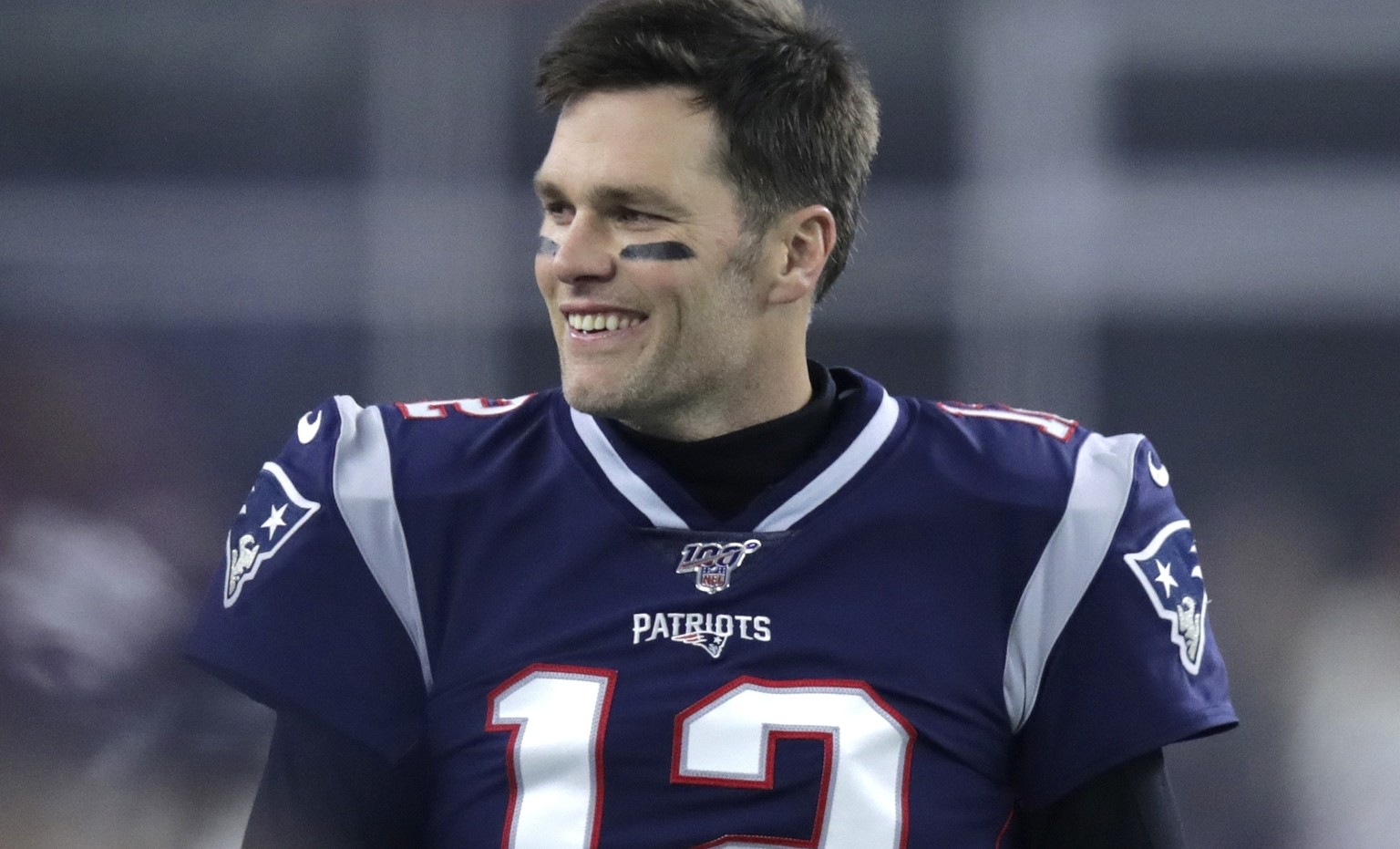 New England Patriots quarterback Tom Brady walks on the field before an NFL wild-card playoff football game against the Tennessee Titans, Saturday, Jan. 4, 2020, in Foxborough, Mass. (AP Photo/Charles ...