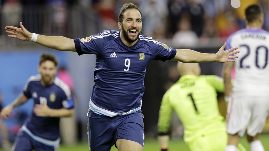 Argentina forward Gonzalo Higuain (9) celebrates his goal against the United States during a Copa America Centenario soccer semifinal, Tuesday, June 21, 2016, in Houston. Argentina won 4-0. (AP Photo/ ...