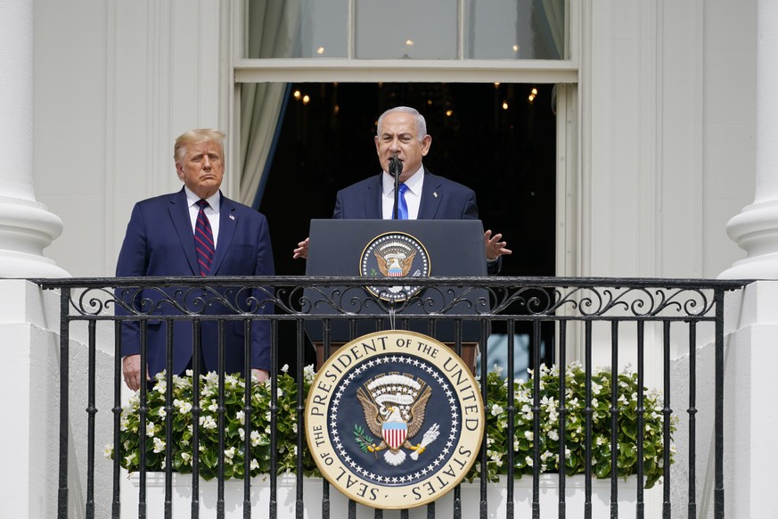 FILE - In this Sept. 15, 2020 file photo, Israeli Prime Minister Benjamin Netanyahu speaks as President Donald Trump looks on, during the Abraham Accords signing ceremony on the South Lawn of the Whit ...